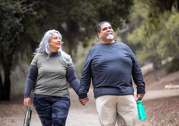 Couple taking a walk in the park. 