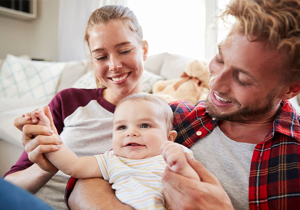 Parents holding their baby boy